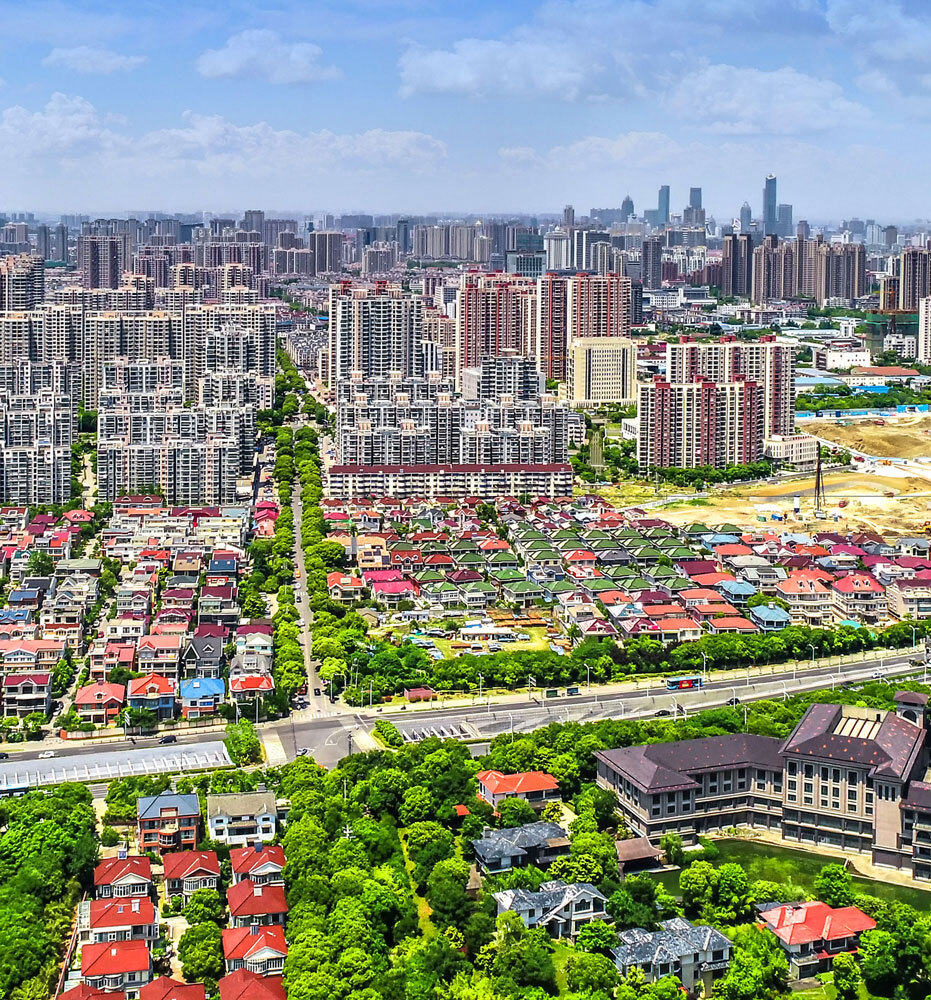 Aerial view of a master-planned residential and commercial development